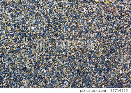 Sea stones background. Colorful small pebbles or stone in garden Sea stones background. Colorful small pebbles or stone in garden 87714355