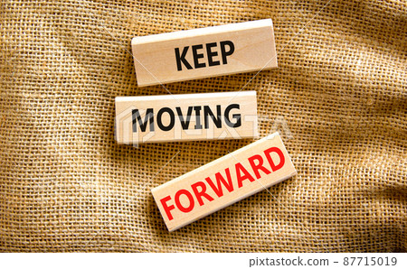 Keep moving forward symbol. Concept words Keep moving forward on blocks on beautiful canvas table canvas background. Business, motivation and keep moving forward concept. Copy space. Keep moving forward symbol. Concept words Keep moving forward on blocks on beautiful canvas table canvas background. Business, motivation and keep moving forward concept. Copy space. 87715019