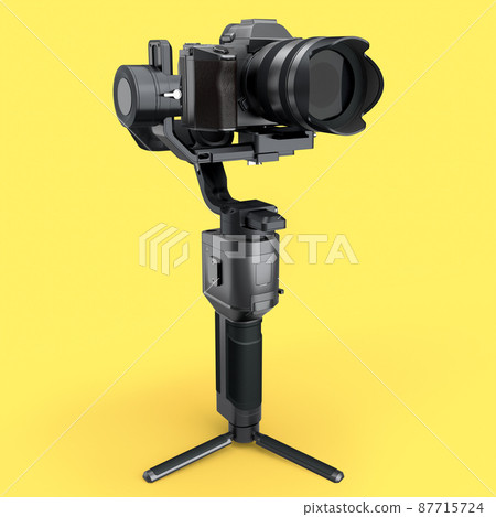 3-axis gimbal stabilization system with nonexistent mirrorless camera on yellow 3-axis gimbal stabilization system with nonexistent mirrorless camera on yellow 87715724