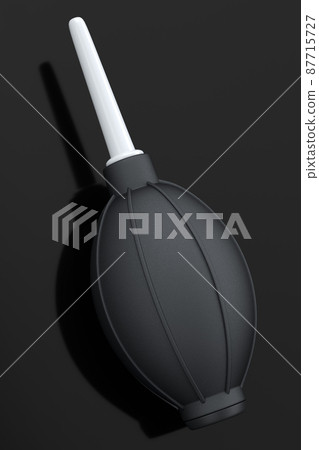 Hand air blower bulb for camera isolated on black background. 87715727