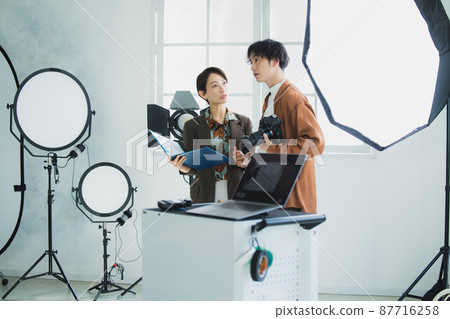 Photographer shooting Photographer shooting 87716258
