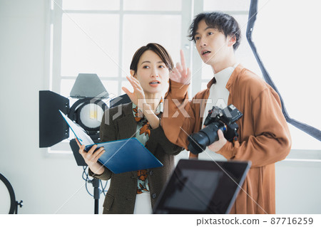 Photographer shooting Photographer shooting 87716259