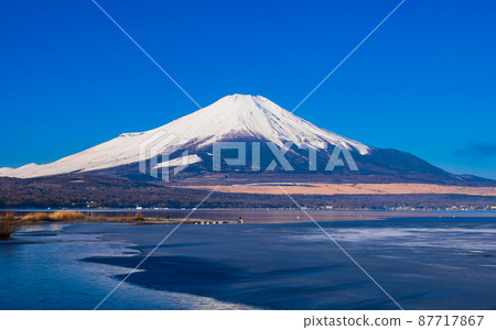 Mt. Fuji winter view from the shore of Lake Yamanaka Mt. Fuji winter view from the shore of Lake Yamanaka 87717867