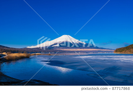 Mt. Fuji winter view from the shore of Lake Yamanaka Mt. Fuji winter view from the shore of Lake Yamanaka 87717868