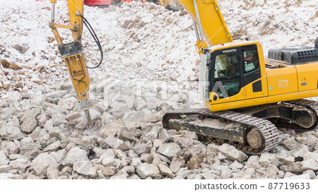 the excavator splits the stones. career equipment. 87719633