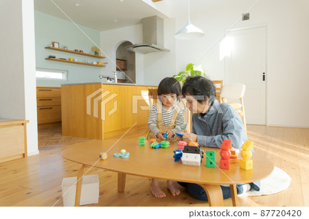 Grandma and grandson wooden house Grandma and grandson wooden house 87720420