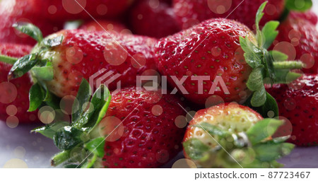 Image of spots over fresh strawberries Image of spots over fresh strawberries 87723467