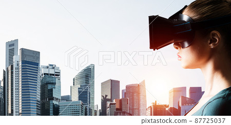 Young woman in VR goggles 87725037