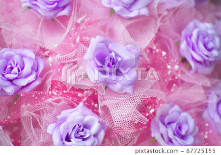 Purple flowers in pink bouquet. For congratulations on various events. 87725155