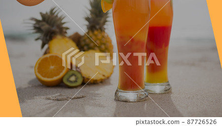 Image of coconuts with cocktail umbrellas falling over multiple cocktails in background Image of coconuts with cocktail umbrellas falling over multiple cocktails in background 87726526