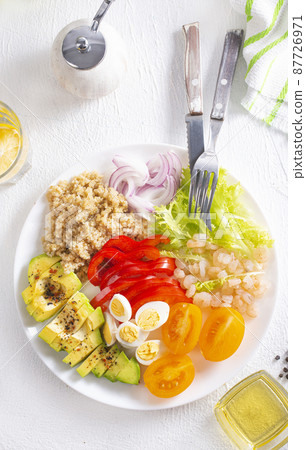 Shrimp salad with avocado, tomatoes and quail eggs. diet food Shrimp salad with avocado, tomatoes and quail eggs. diet food 87726971