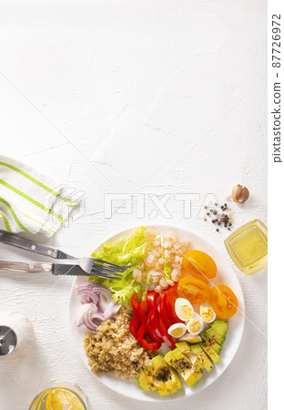 Shrimp salad with avocado, tomatoes and quail eggs. diet food Shrimp salad with avocado, tomatoes and quail eggs. diet food 87726972