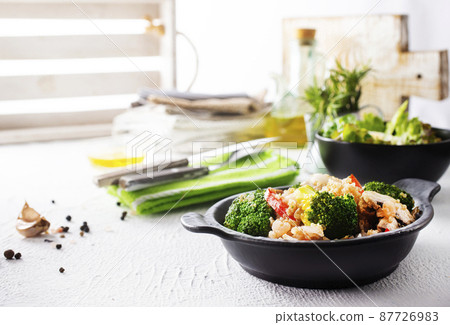 vegetarian stir fry in black pan, vegan food vegetarian stir fry in black pan, vegan food 87726983