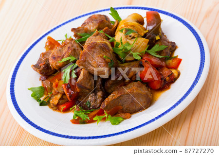 Meat baked with mushrooms and vegetables 87727270