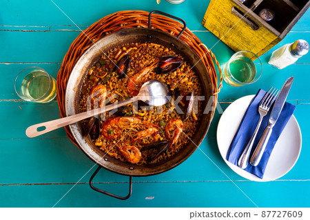 Paella in frying pan Paella in frying pan 87727609