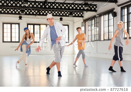 Young people dancing swing and shuffle Young people dancing swing and shuffle 87727618