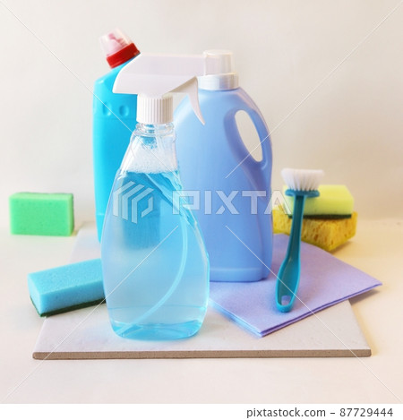 Liquid detergents in plastic bottles, home cleaning products on the table, light background, the concept of cleaning, order, cleanliness, home delivery Liquid detergents in plastic bottles, home cleaning products on the table, light background, the concept of cleaning, order, cleanliness, home delivery 87729444