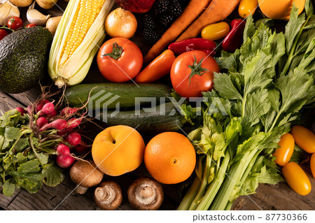Directly above shot of various fruits and vegetables on table Directly above shot of various fruits and vegetables on table 87730366