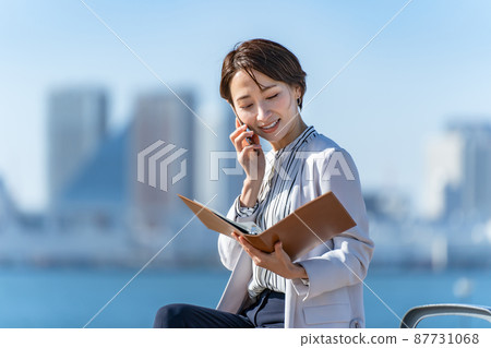 Blue sky business female middle Blue sky business female middle 87731068