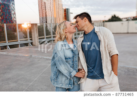 happy young couple on roof top city parking happy young couple on roof top city parking 87731465