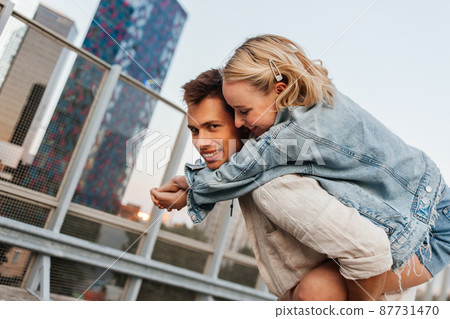 happy young couple having fun on roof top parking happy young couple having fun on roof top parking 87731470