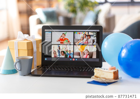 laptop with video call or online birthday party laptop with video call or online birthday party 87731471