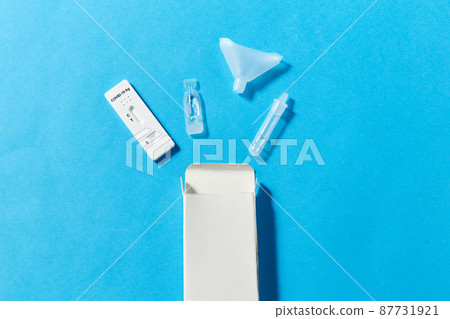 coronavirus salvia self testing kit on blue coronavirus salvia self testing kit on blue 87731921