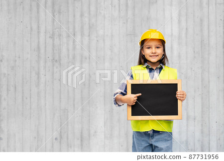 little girl in construction helmet with chalkboard little girl in construction helmet with chalkboard 87731956
