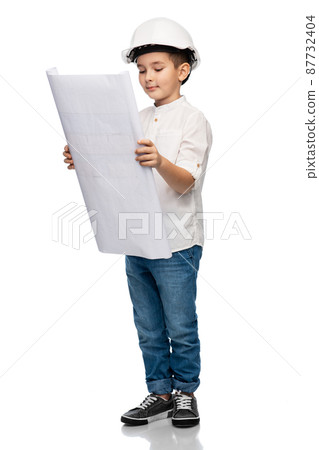 little boy in construction helmet with blueprint 87732404