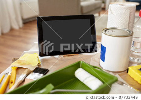 close up of tablet pc and painting tools on table close up of tablet pc and painting tools on table 87732449