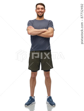 smiling man in sports clothes smiling man in sports clothes 87732492