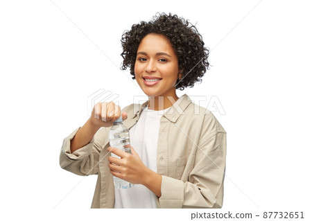 happy woman with water in plastic bottle happy woman with water in plastic bottle 87732651