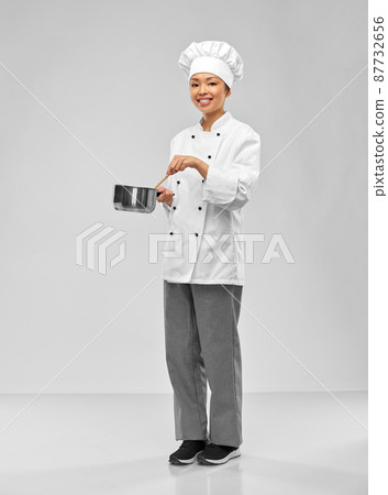 happy smiling female chef with saucepan happy smiling female chef with saucepan 87732656
