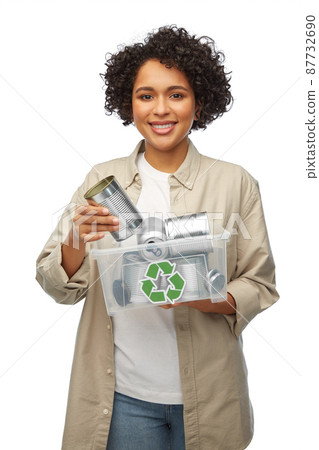 happy smiling woman sorting metallic waste 87732690