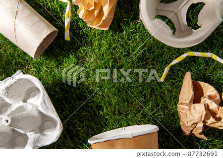 close up of paper waste on grass 87732691