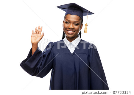 happy female graduate student in mortarboard happy female graduate student in mortarboard 87733334
