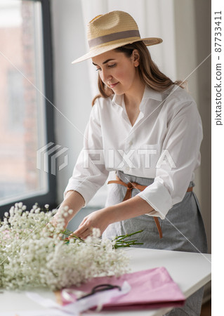 happy woman with gypsophila flowers at studio happy woman with gypsophila flowers at studio 87733411