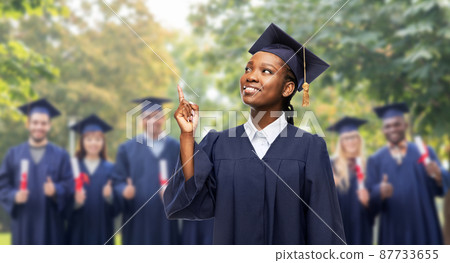 happy female graduate student in mortarboard happy female graduate student in mortarboard 87733655