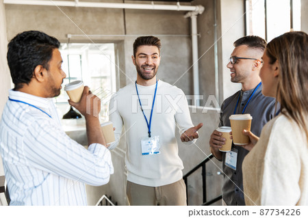 business people drinking takeaway coffee at office business people drinking takeaway coffee at office 87734226
