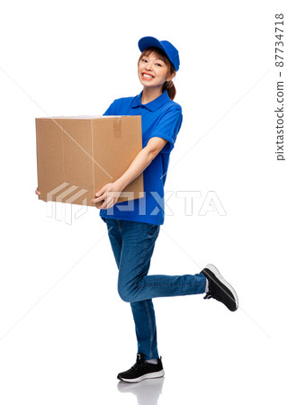 delivery woman in blue uniform with parcel box 87734718
