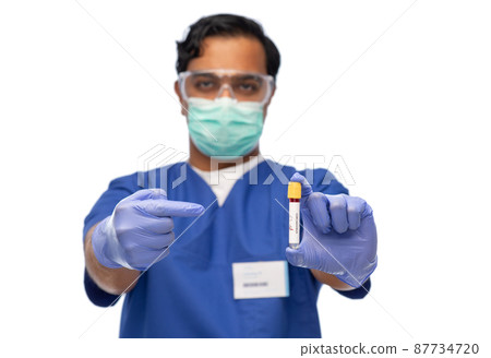 male doctor in mask with blood in test tube male doctor in mask with blood in test tube 87734720