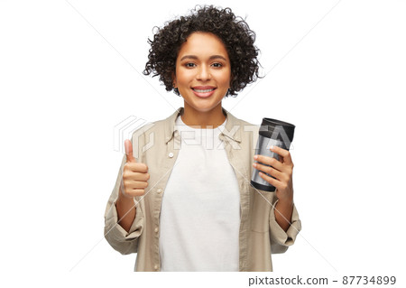 woman with thermo cup or tumbler for hot drinks woman with thermo cup or tumbler for hot drinks 87734899