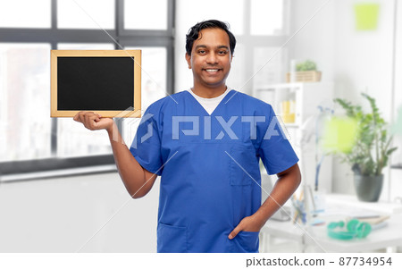 happy male doctor or nurse with chalkboard happy male doctor or nurse with chalkboard 87734954