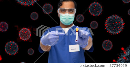male doctor in mask with blood in test tube 87734959