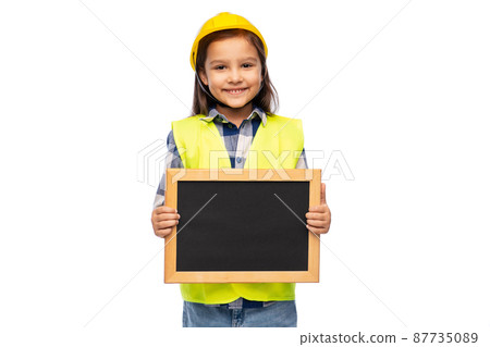little girl in construction helmet with chalkboard little girl in construction helmet with chalkboard 87735089