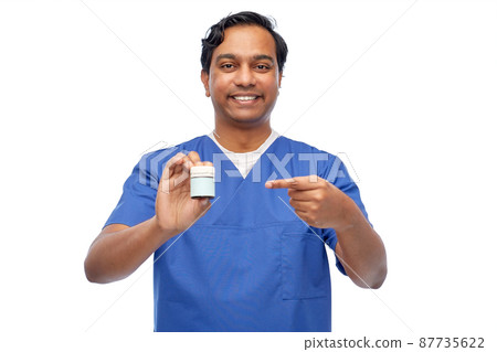 indian doctor or male nurse holding medicine indian doctor or male nurse holding medicine 87735622