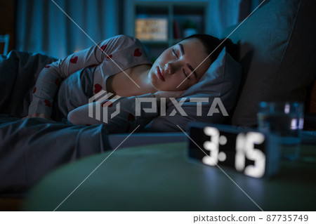 teenage girl sleeping at home at night teenage girl sleeping at home at night 87735749
