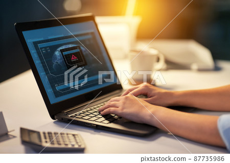 businesswoman with laptop at dark night office businesswoman with laptop at dark night office 87735986