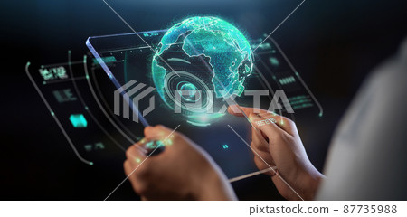 hands with transparent tablet pc and hologram hands with transparent tablet pc and hologram 87735988