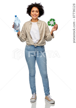 woman with green recycling sign and plastic bottle 87736128